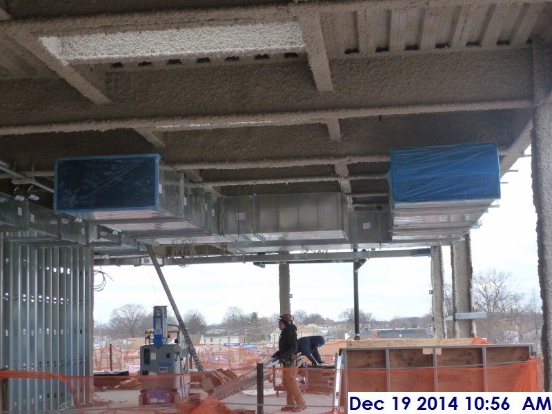 Installing ductwork at the 4th floor Facing West
